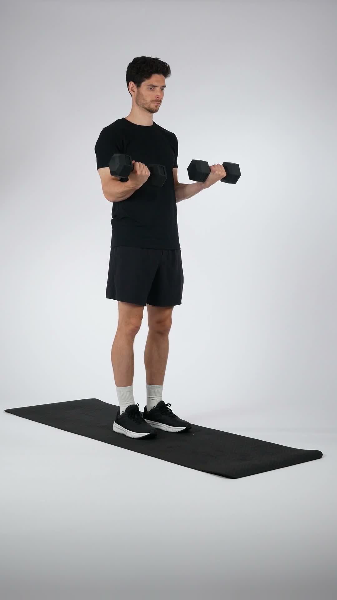 Dumbbell wrist curls exercise stock photo, forearms