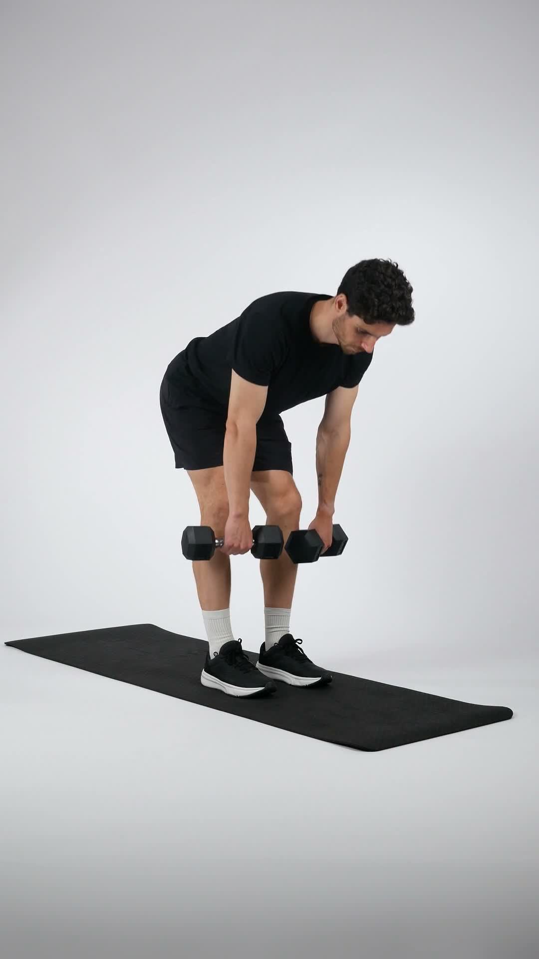 Dumbbell Romanian Deadlift exercise stock photo, hamstrings