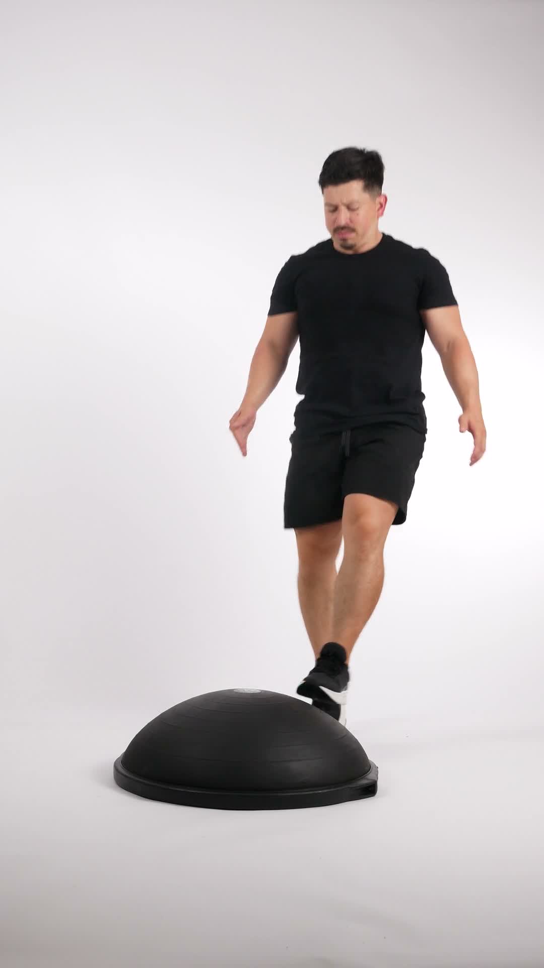 Bosu Toe Taps exercise stock photo, cardio