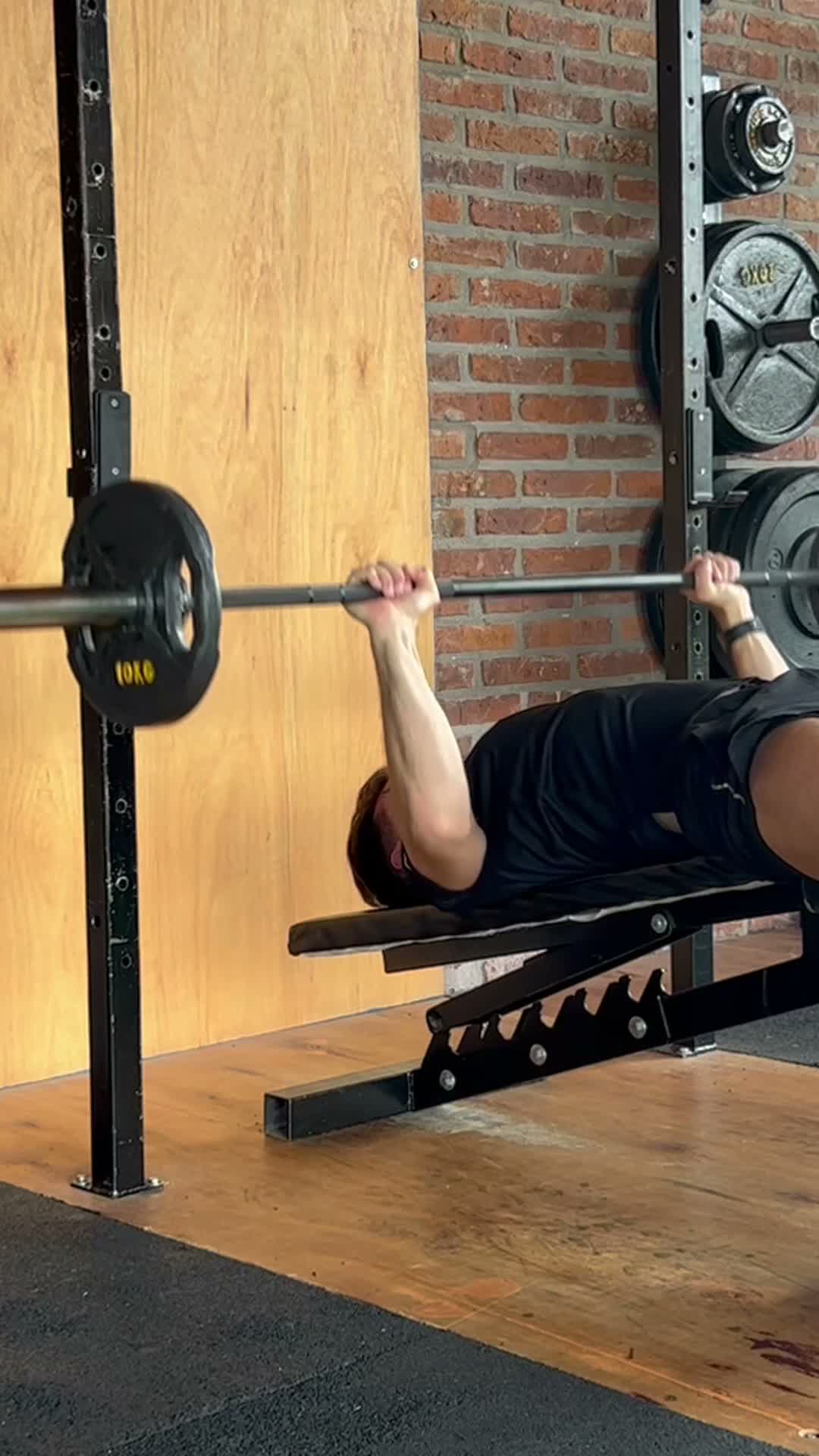 Barbell Bench Press decline exercise stock photo, lower chest