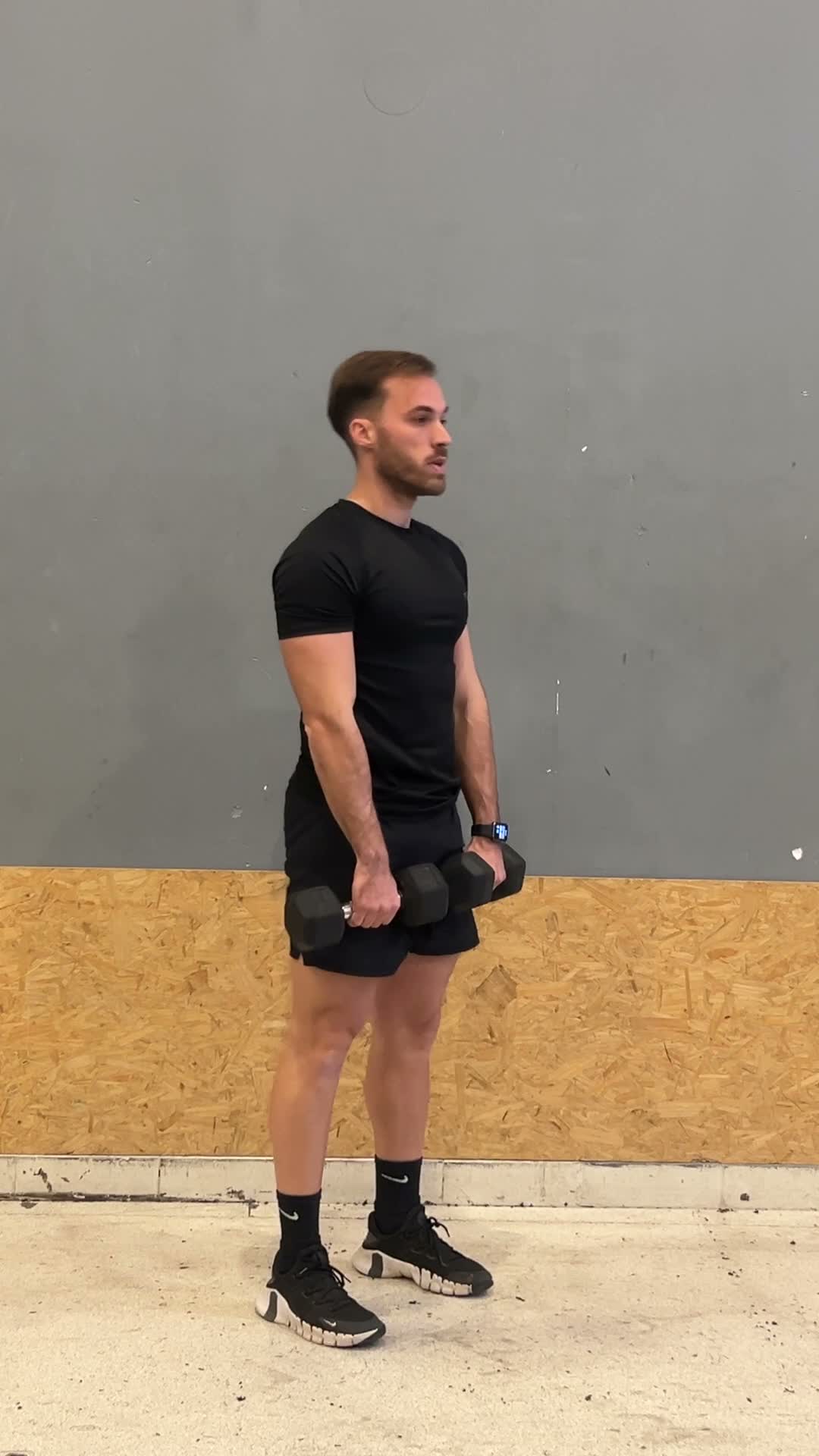Dumbbell Romanian Deadlift exercise stock photo, hamstrings