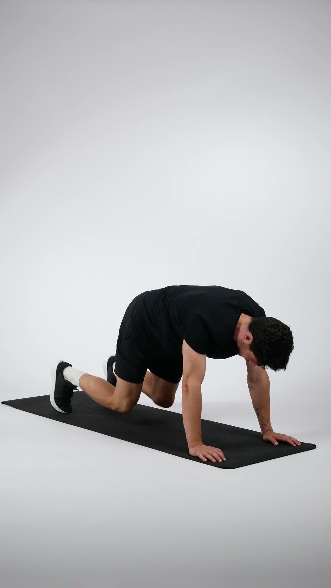 Bear Crawl to Downward Dog exercise stock photo, full body