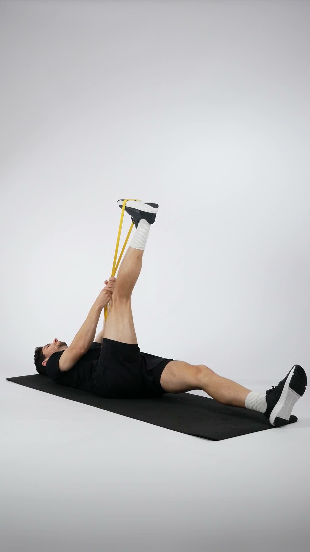 Band Hamstring Stretch exercise stock photo, hamstrings