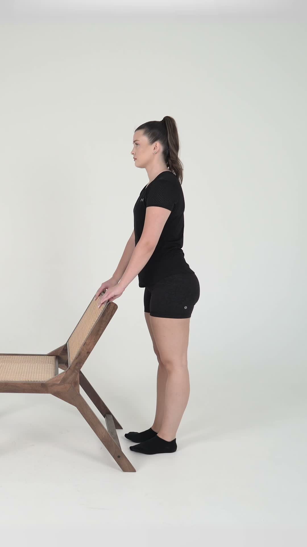 Heel Raises toe raises exercise stock photo, calves