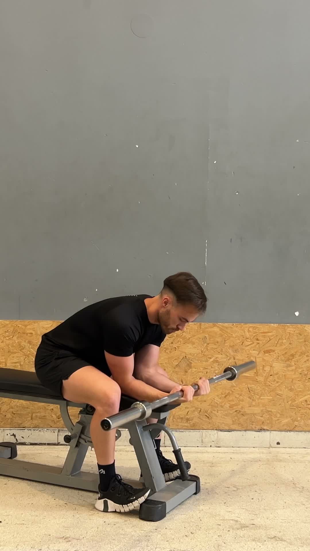 Barbell Wrist Curl exercise stock photo, forearm flexors