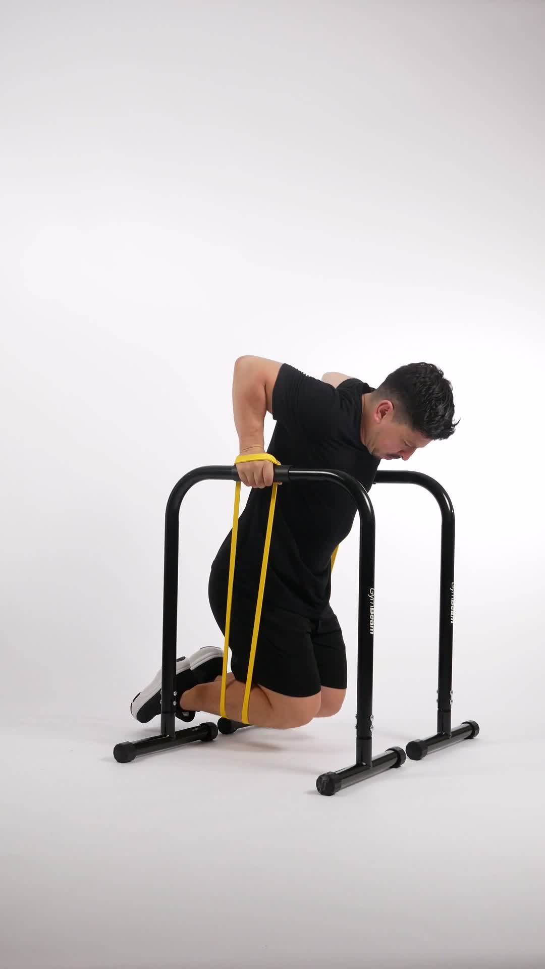 Band Assisted Dip exercise stock photo, triceps