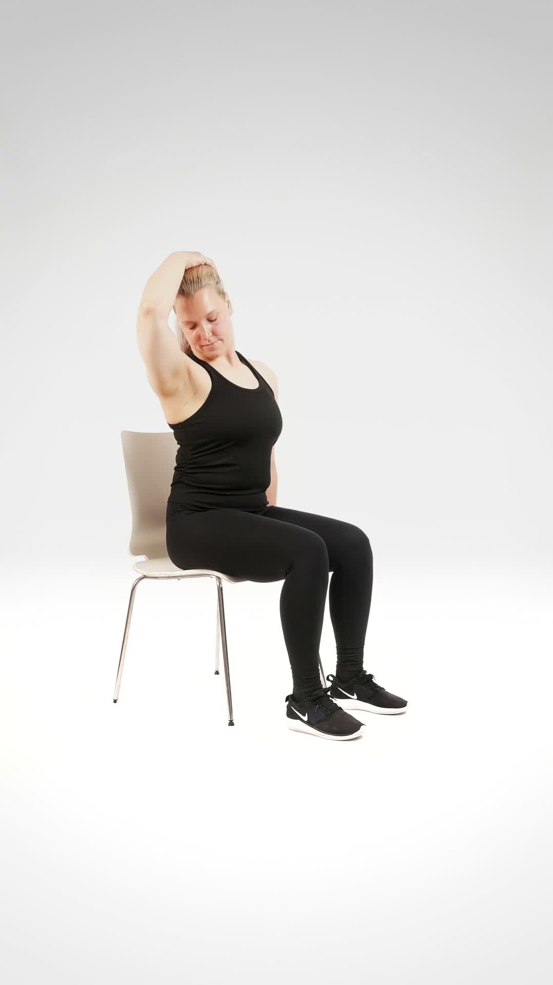 Seated Neck Side Stretch exercise stock photo, neck