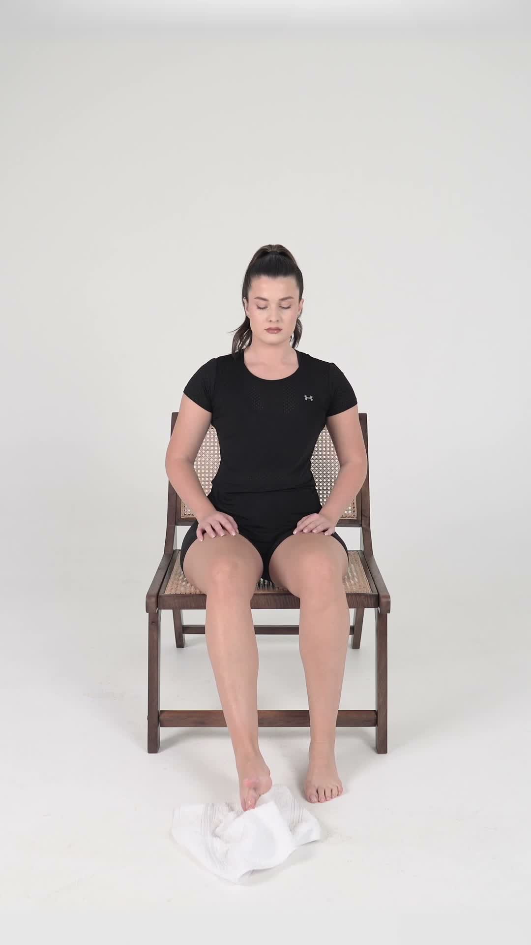 First Toe Curl with Towel exercise stock photo, forearms