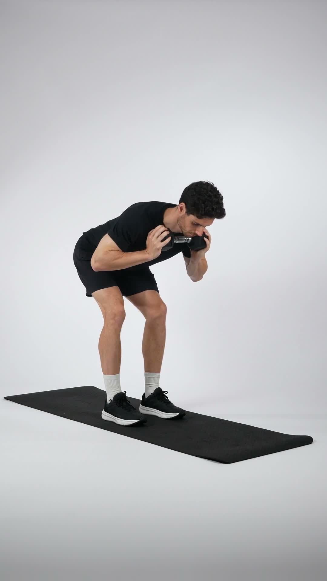 Dumbbell Good Morning exercise stock photo, hamstrings