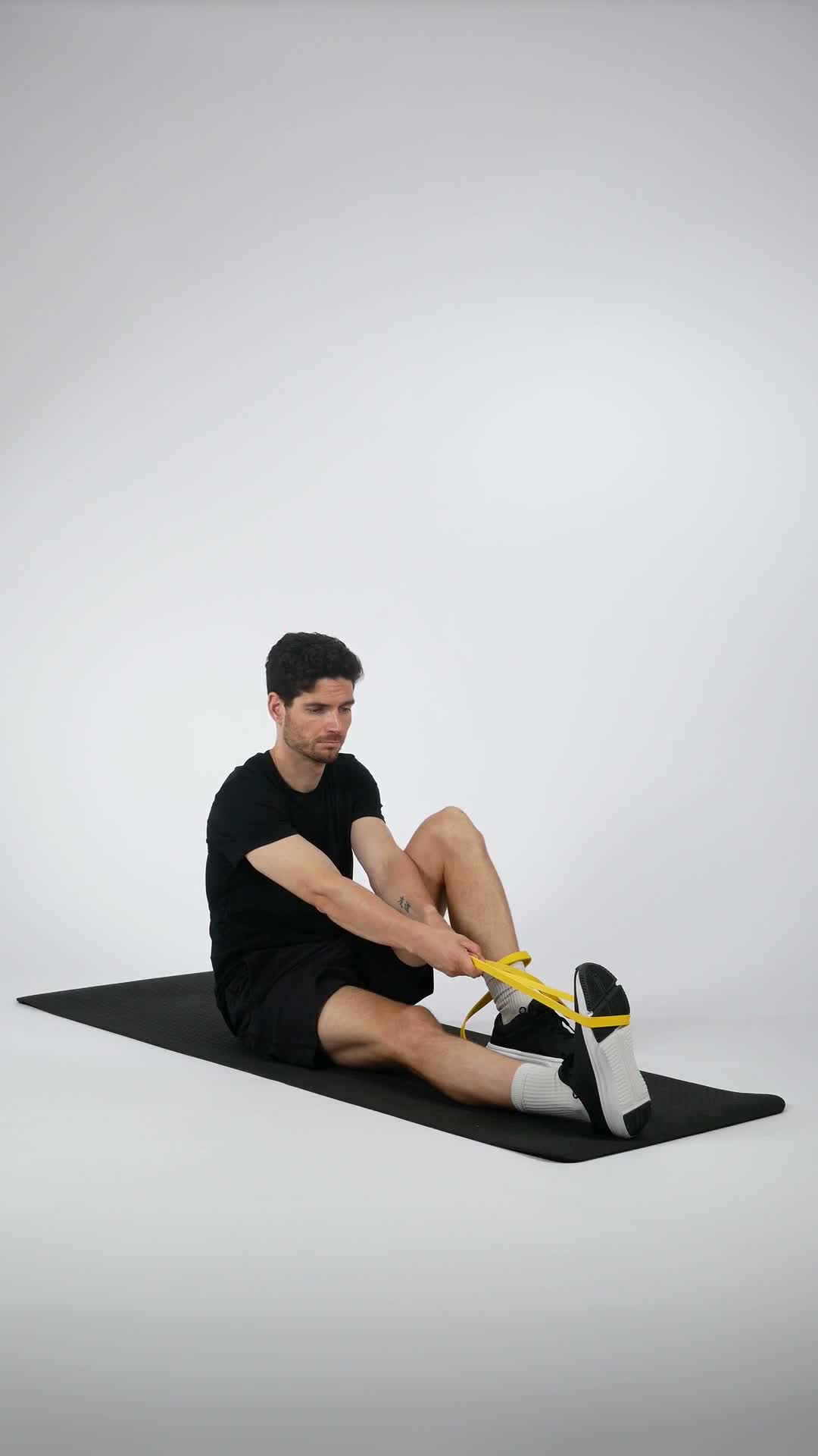 Band Ankle Plantarflexion exercise stock photo, calves