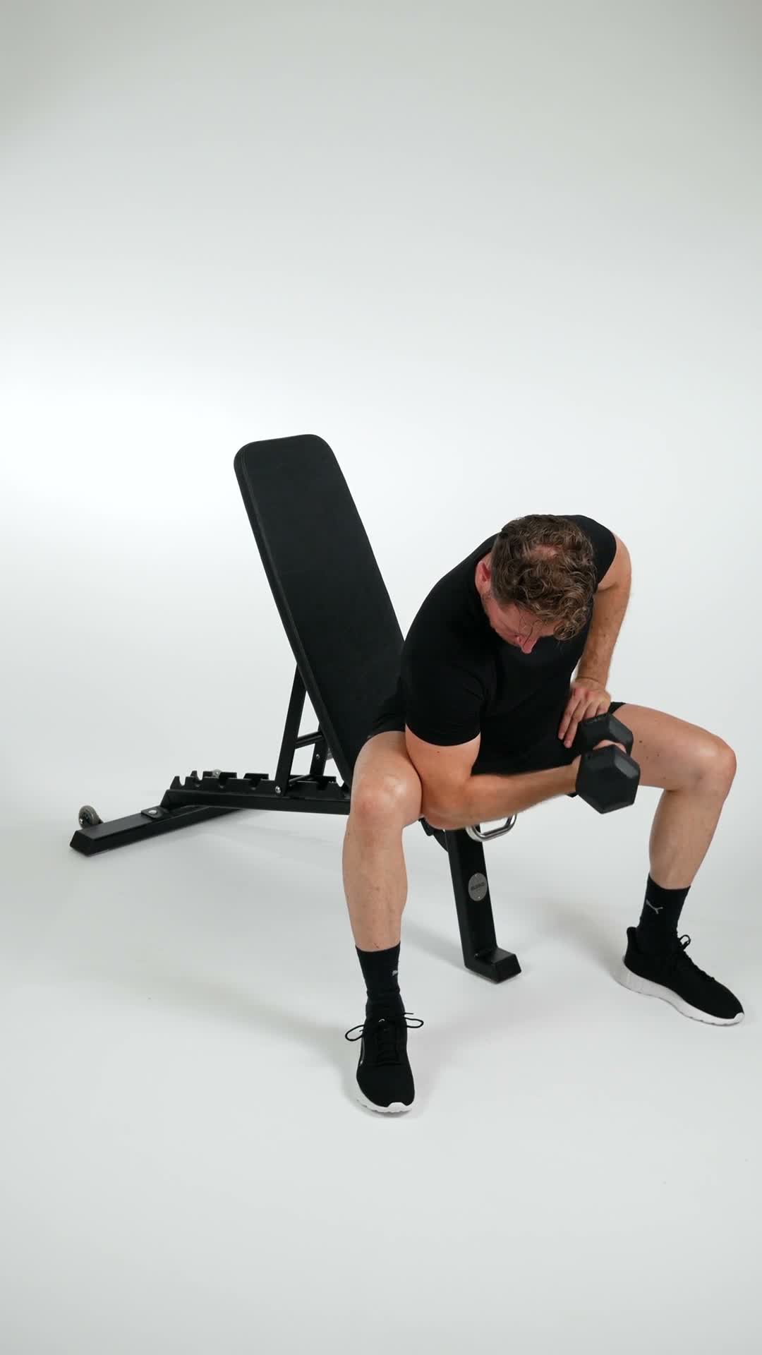 Concentration Curl exercise stock photo, biceps