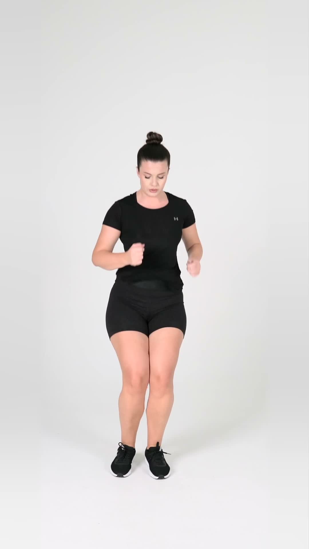 Forward Backward Hop over Cone exercise stock photo, calves