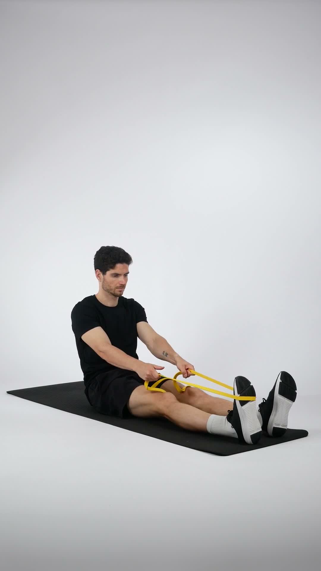 Banded Heel Slide exercise stock photo, legs
