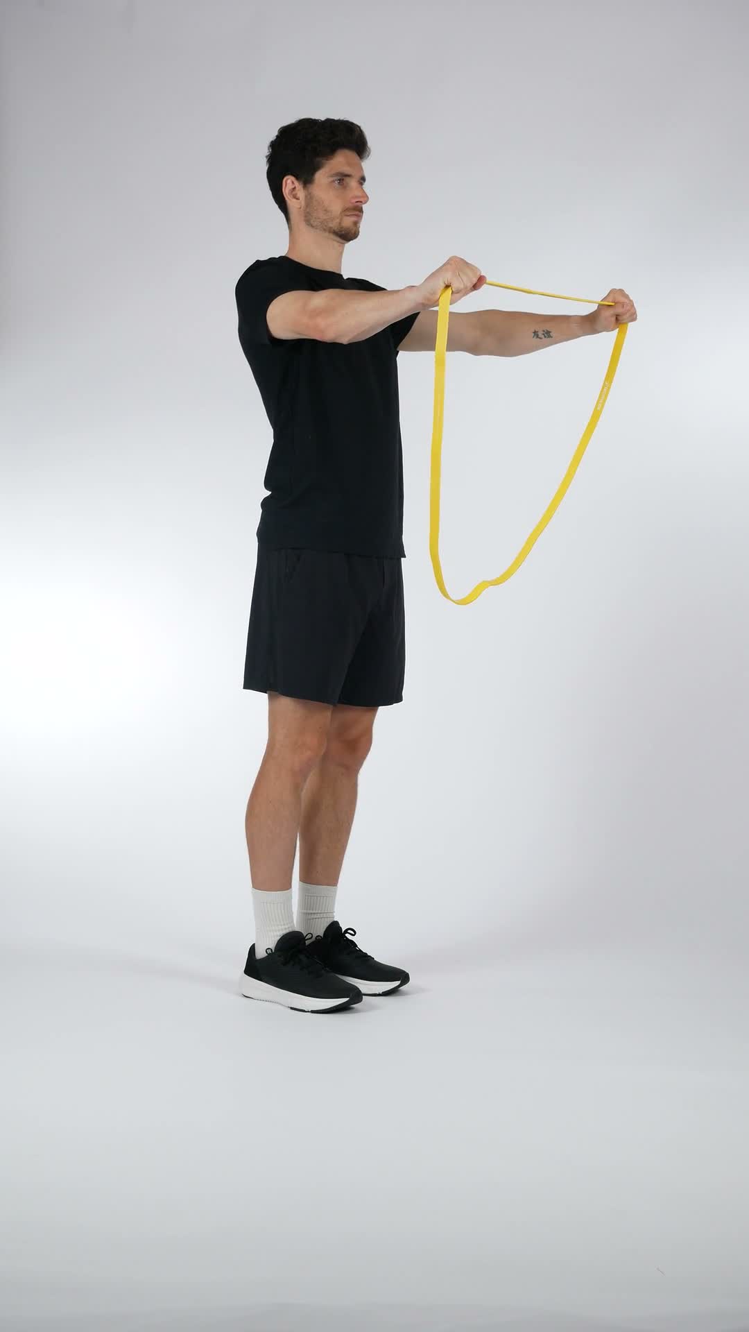 Band Pull-Apart exercise stock photo, shoulders