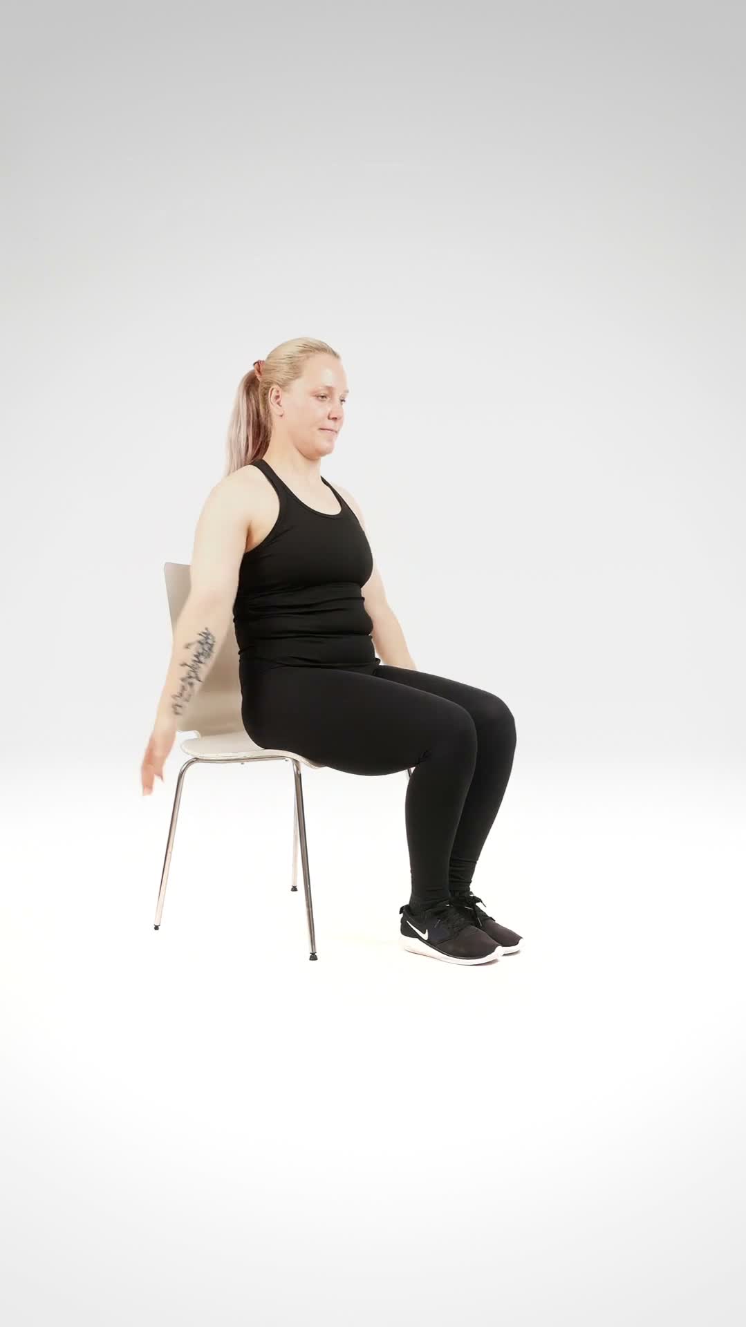 Seated Jumping Jacks exercise stock photo, cardio